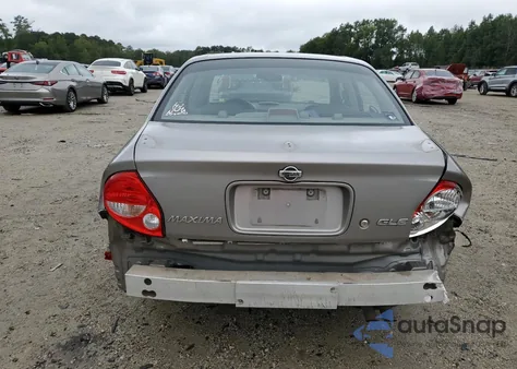 2001 Nissan Maxima Gxe z USA, uszkodzony, nr VIN JN1CA31A21T100459
